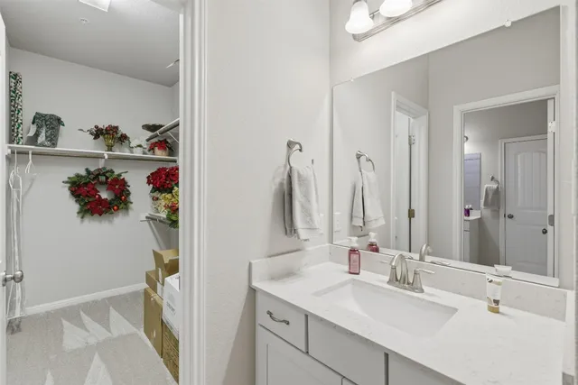 a bathroom with a bathtub and a sink