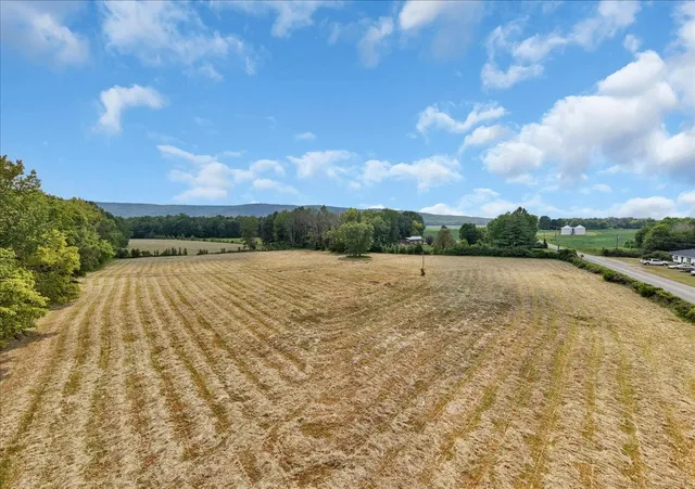 a view of swimming pool with a lake view