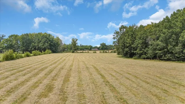 a view of swimming pool from a yard