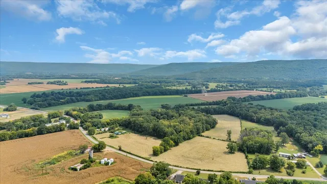 an aerial view of a houses with outdoor space