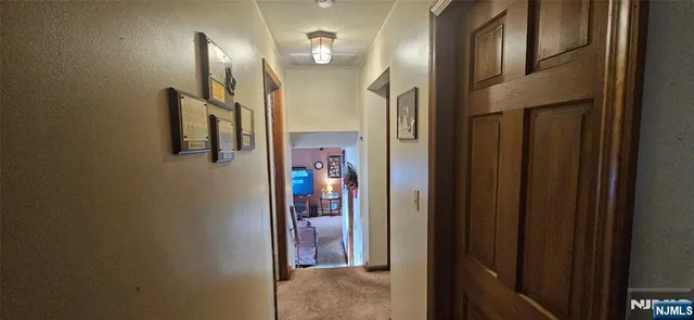 a view of a hallway with a elevator