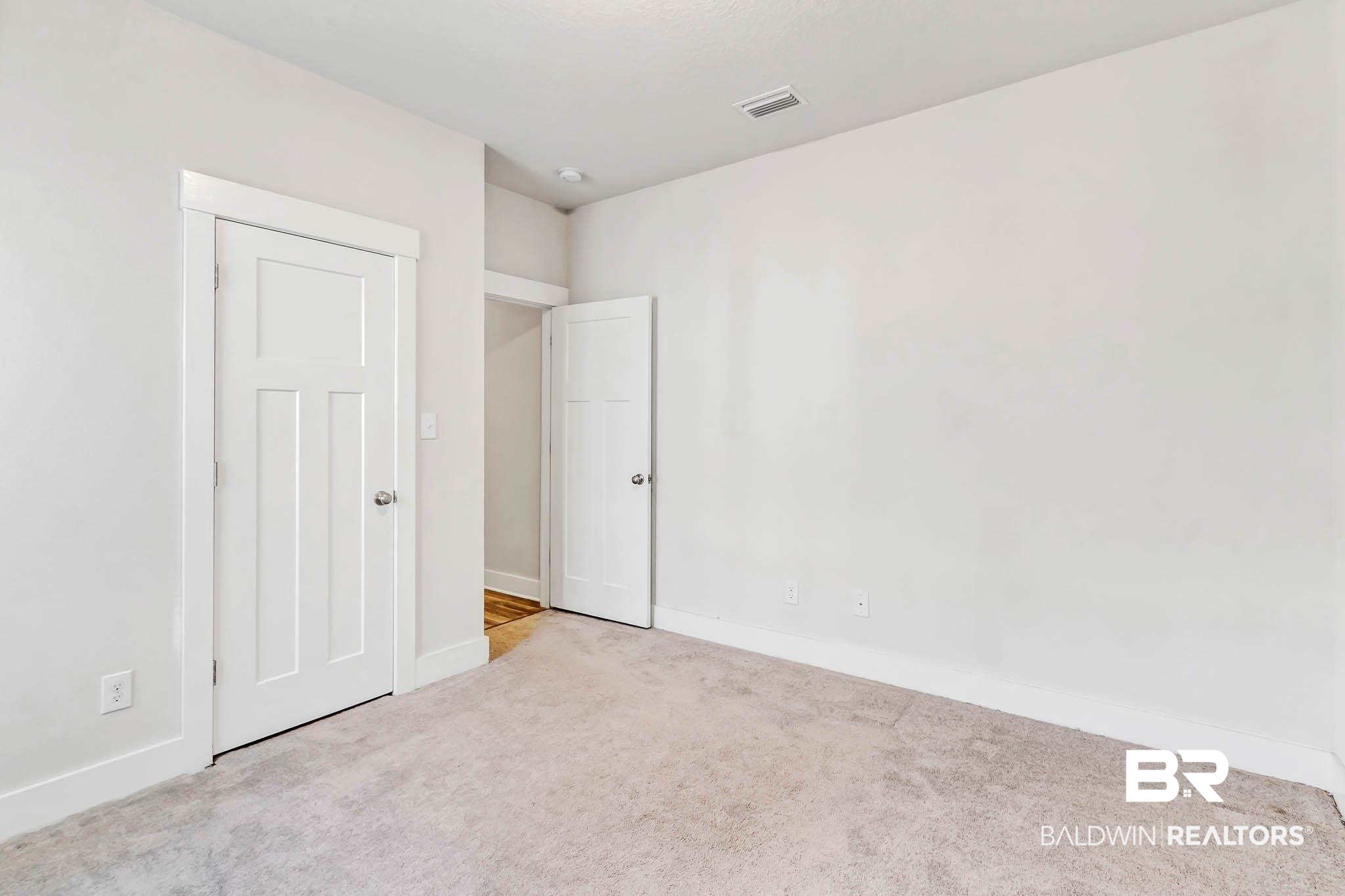 16461 Prado Loop Loxley, AL 36551 - Photo 32 of 78 Unfurnished bedroom with carpet flooring and baseboards