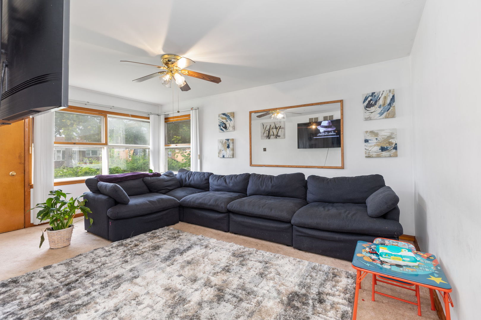 4719 Butterfield Road Hillside, IL 60162 - Photo 2 of 15 a living room with furniture and a large window