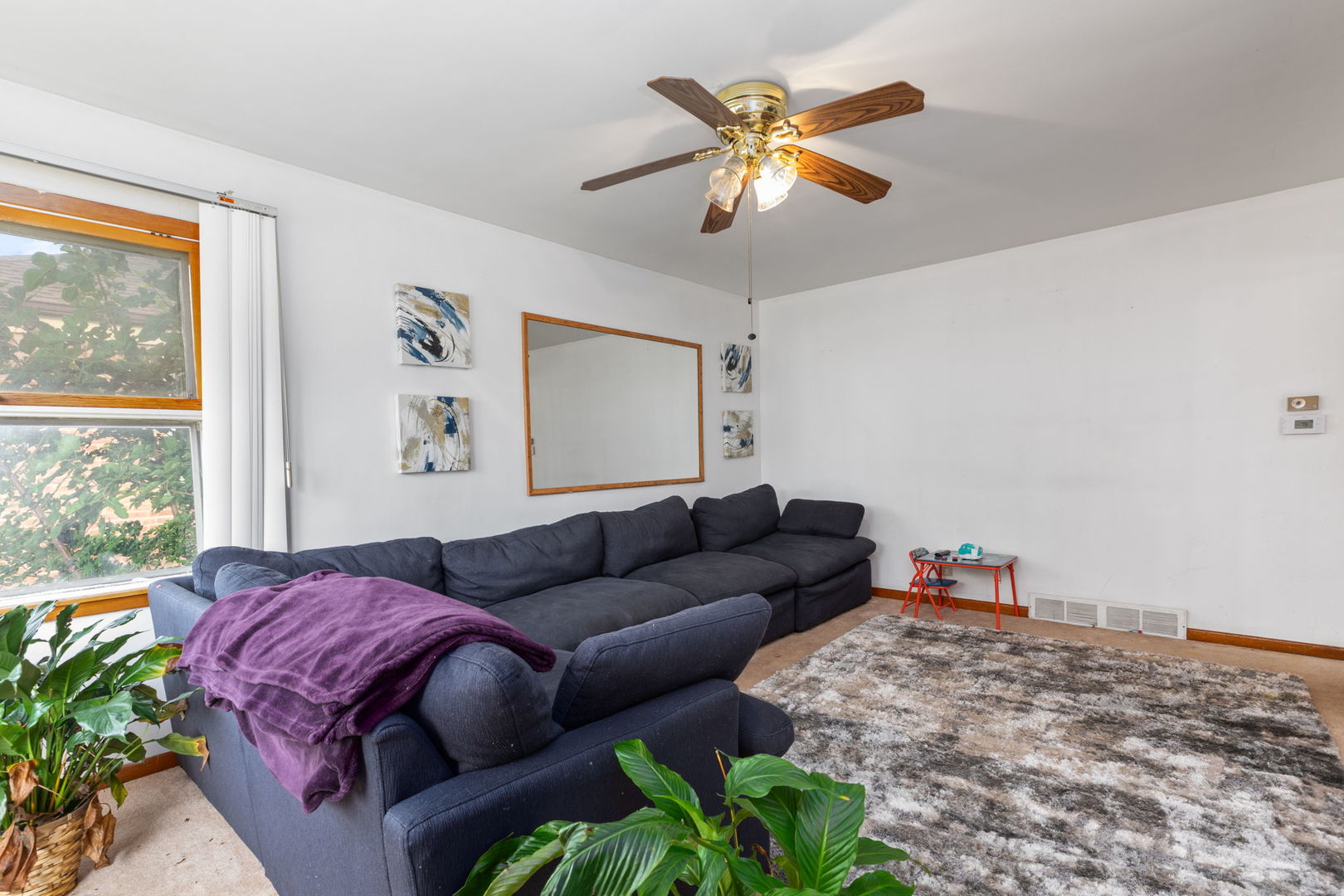 4719 Butterfield Road Hillside, IL 60162 - Photo 3 of 15 a living room with furniture and a window