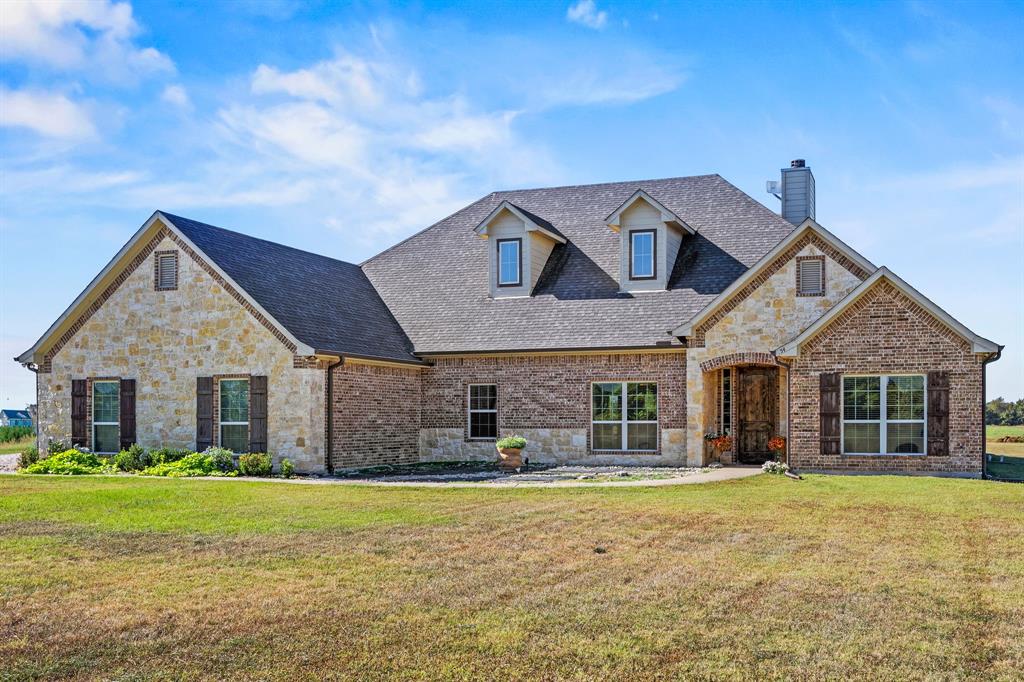 454 Farr Altom Road Seagoville, TX 75159 - Photo 13 of 29 a front view of a house with a garden and porch