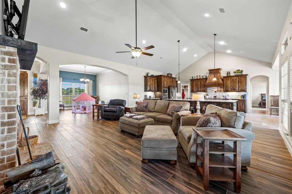 454 Farr Altom Road Seagoville, TX 75159 - Photo 5 of 29 a living room with furniture and a wooden floor