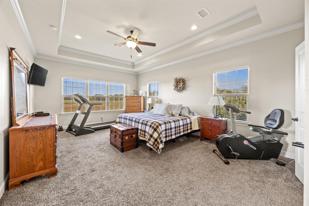 454 Farr Altom Road Seagoville, TX 75159 - Photo 7 of 29 a bedroom with furniture and a flat screen tv