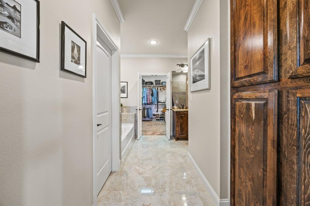 454 Farr Altom Road Seagoville, TX 75159 - Photo 9 of 29 a view of a hallway with closet and a bathroom