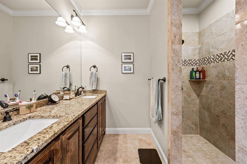 454 Farr Altom Road Seagoville, TX 75159 - Photo 10 of 29 a bathroom with a granite countertop sink a mirror and shower