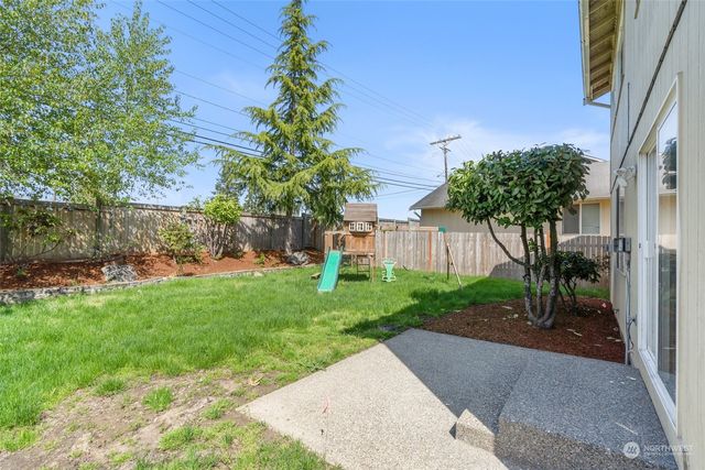 a view of a backyard with a garden