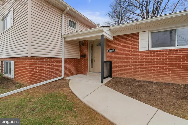 a view of backyard of a house