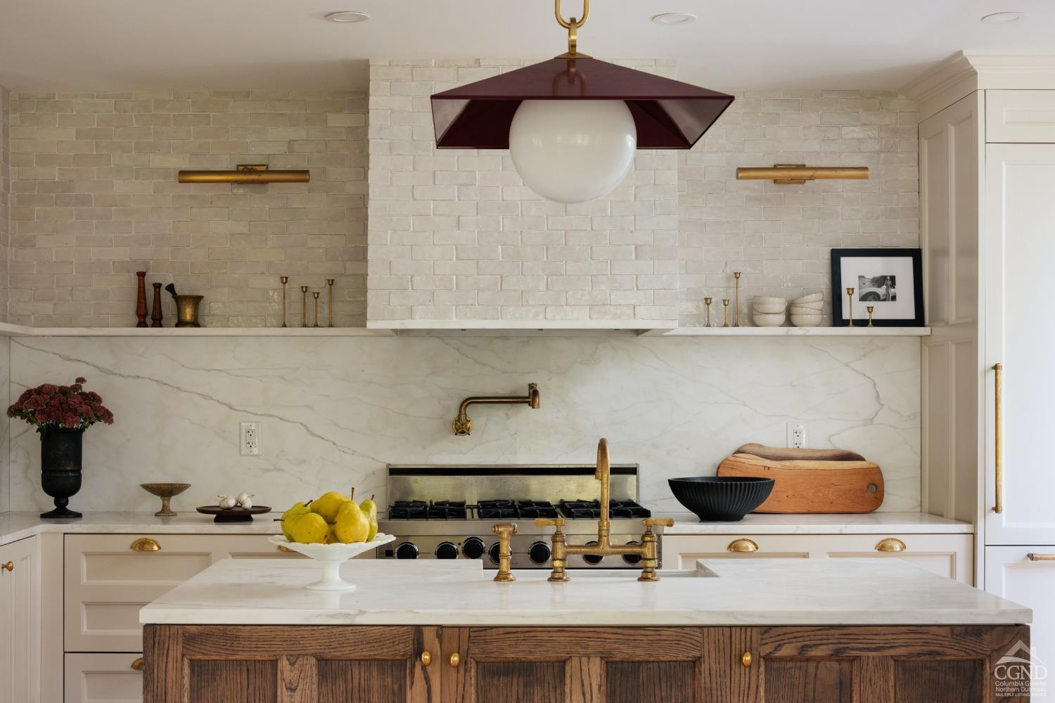 730 Ackert Hook Road Rhinebeck, NY 12572 - Photo 12 of 45 a kitchen with a stove and a wooden floor
