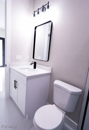 a bathroom with a double vanity sink