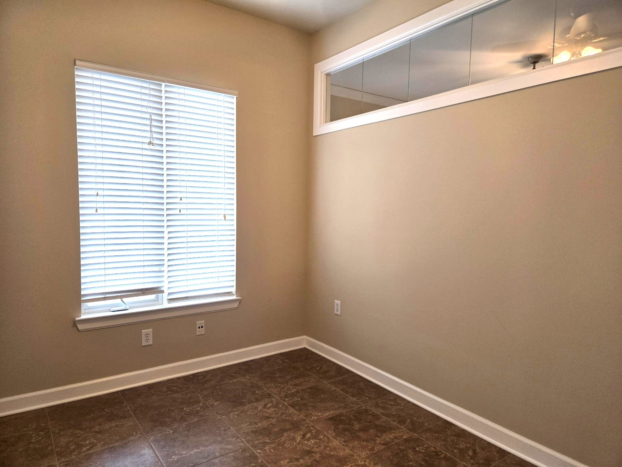 1900 Genesee Street, Unit 207 Houston, TX 77006 - Photo 30 of 50 Secondary bedroom with good size closet. Window on right allows for extra natural light through living room.