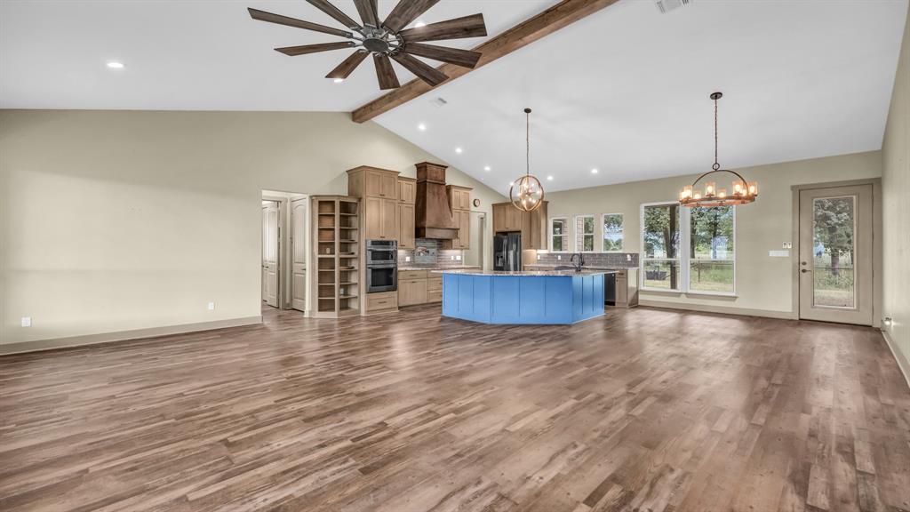 990 Doss Road Millsap, TX 76066 - Photo 39 of 40 a view of kitchen and hall with wooden floor