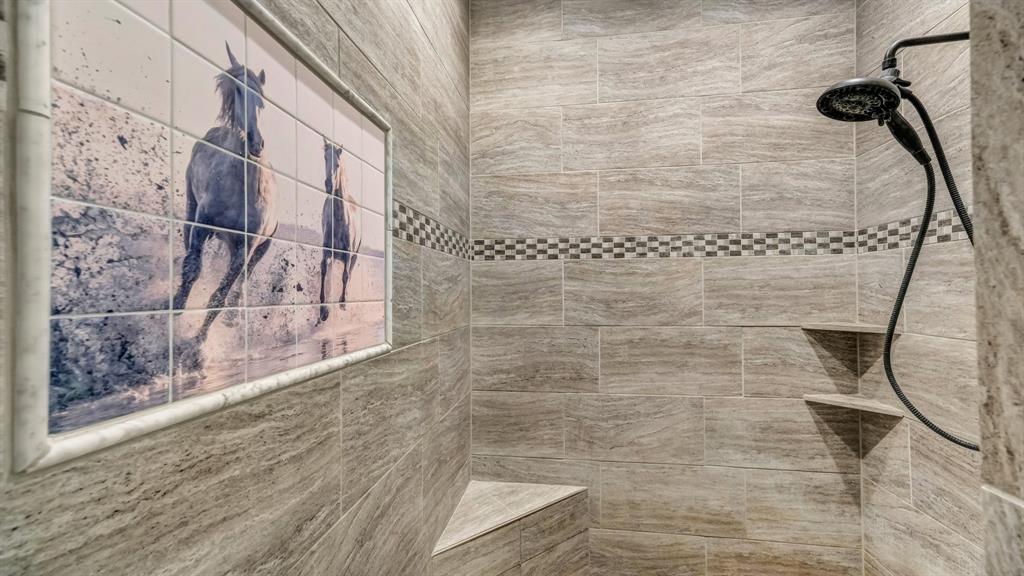 990 Doss Road Millsap, TX 76066 - Photo 25 of 40 a bathroom with a shower