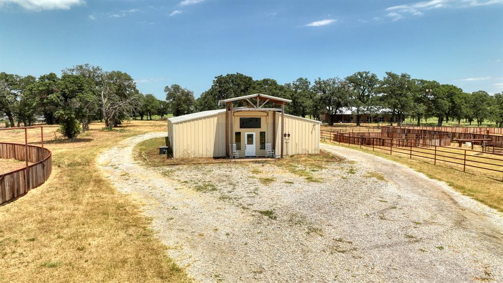 990 Doss Road Millsap, TX 76066 - Photo 29 of 40 a view of a house with a yard