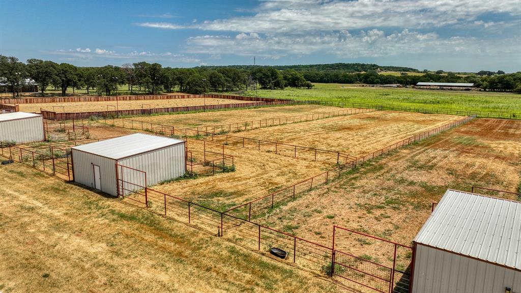 990 Doss Road Millsap, TX 76066 - Photo 34 of 40 a view of a lake with a yard