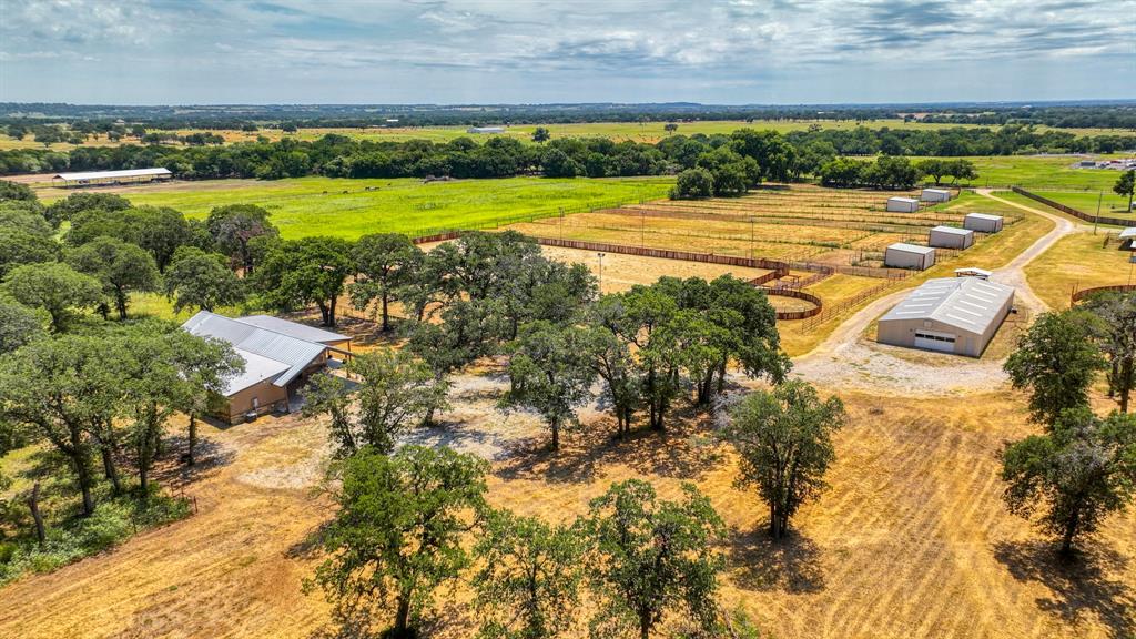 990 Doss Road Millsap, TX 76066 - Photo 37 of 40 a view of a swimming pool with an outdoor space and seating area
