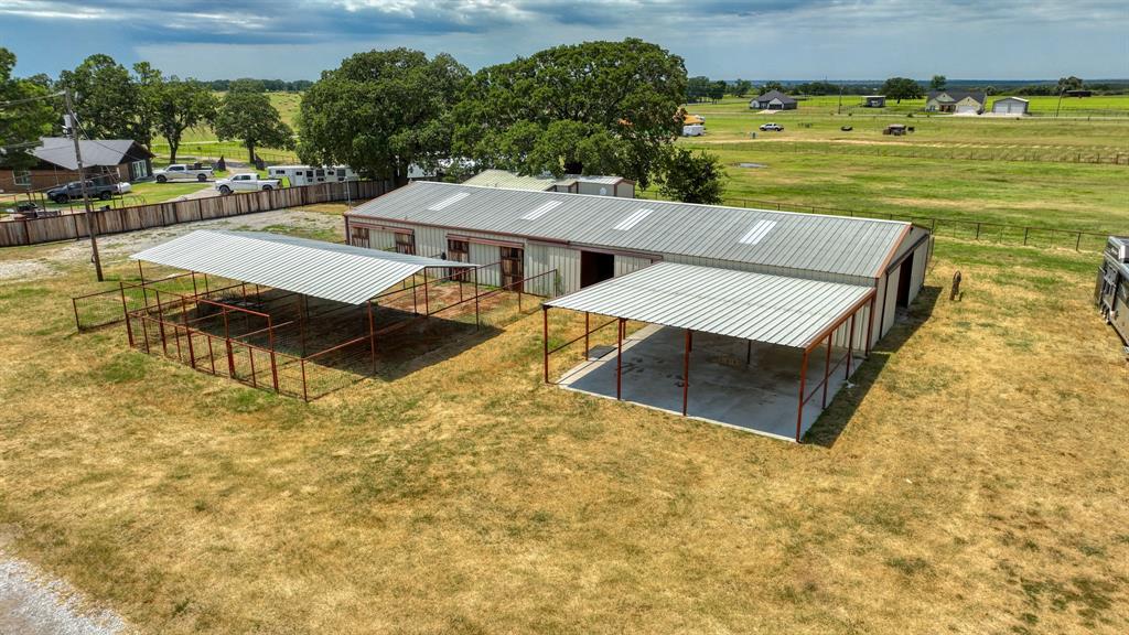 990 Doss Road Millsap, TX 76066 - Photo 6 of 40 a view of a terrace with a table