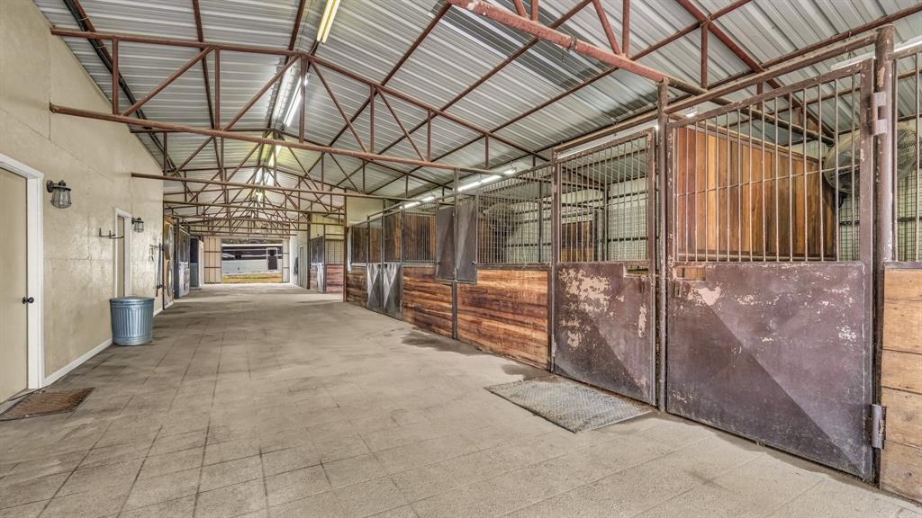 990 Doss Road Millsap, TX 76066 - Photo 7 of 40 a view of empty room with wooden walls