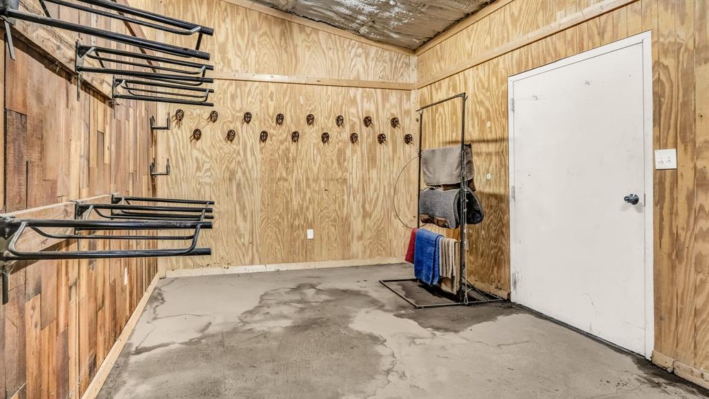 990 Doss Road Millsap, TX 76066 - Photo 10 of 40 a view of a room with stairs and a large window