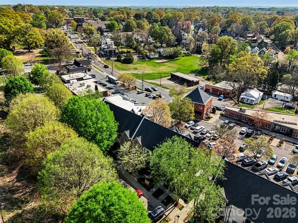 an aerial view of a city with lots of residential buildings