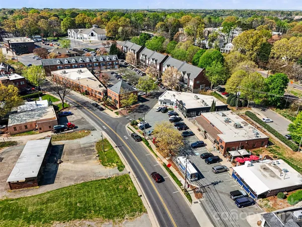 an aerial view of a city with lots of residential buildings