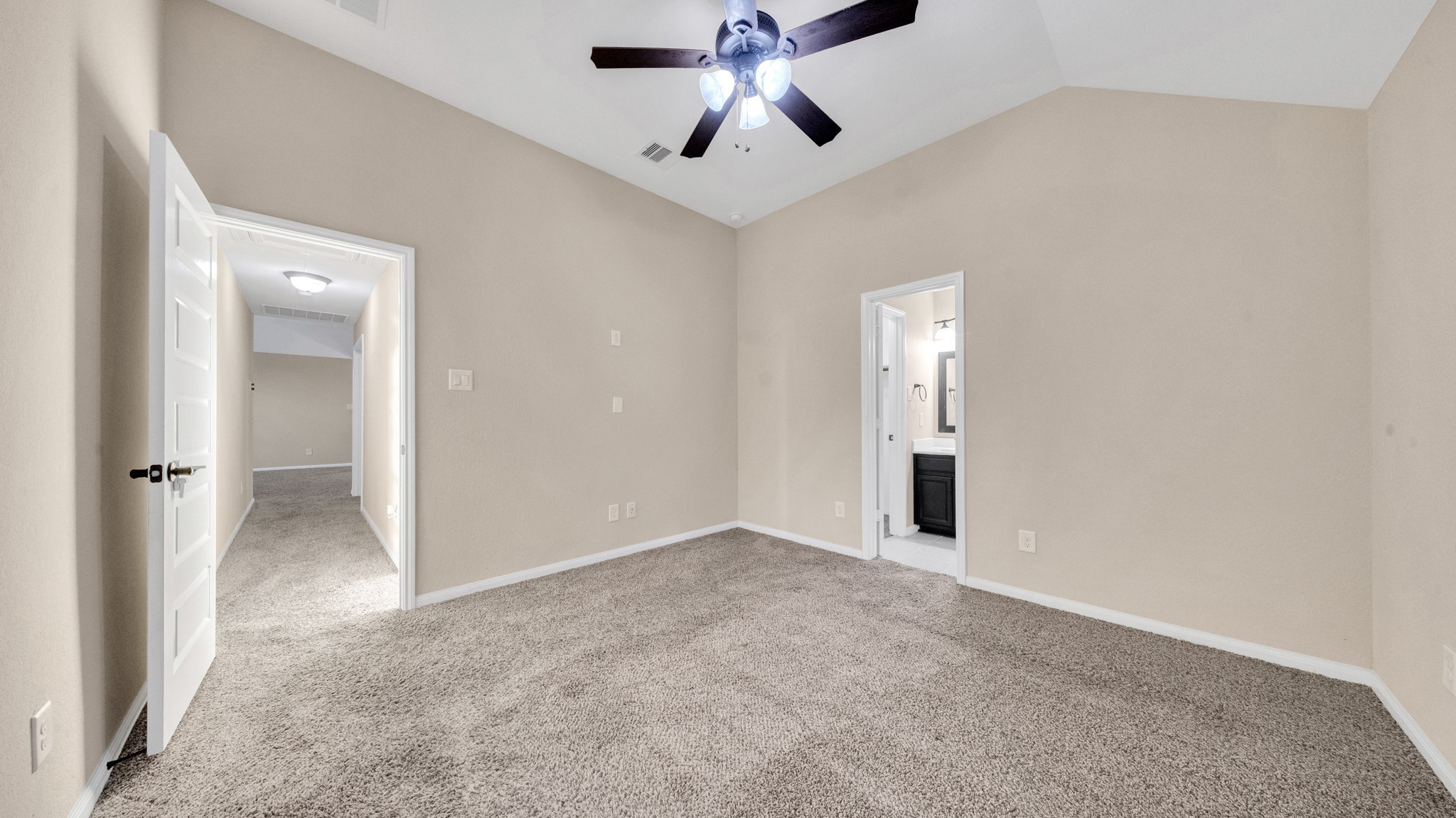 18118 Berry Garden Lane Spring, TX 77379 - Photo 34 of 45 an empty room and chandelier fan
