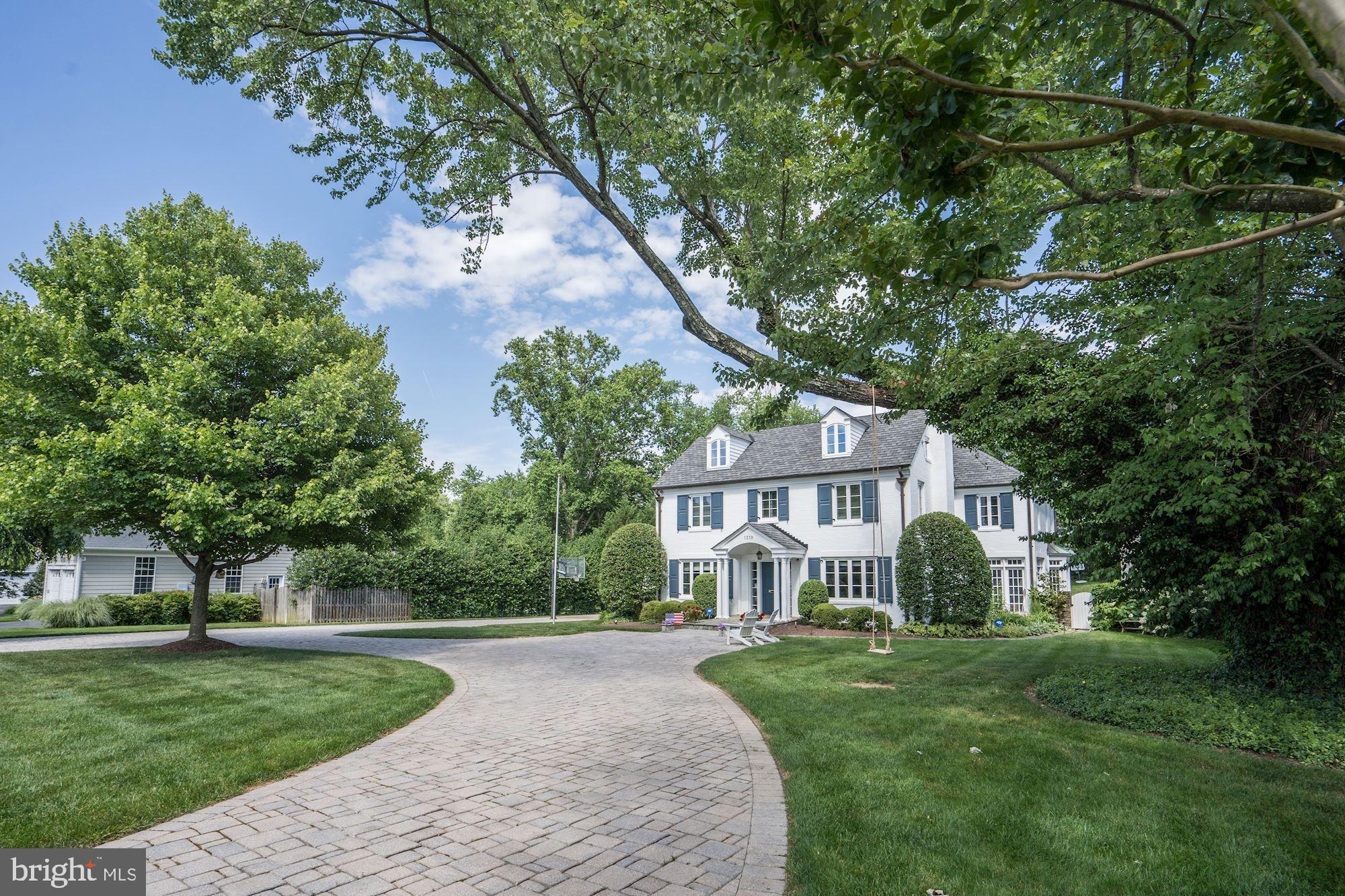 1319 Calder Road McLean, VA 22101 - Photo 1 of 55 a front view of a house with a garden