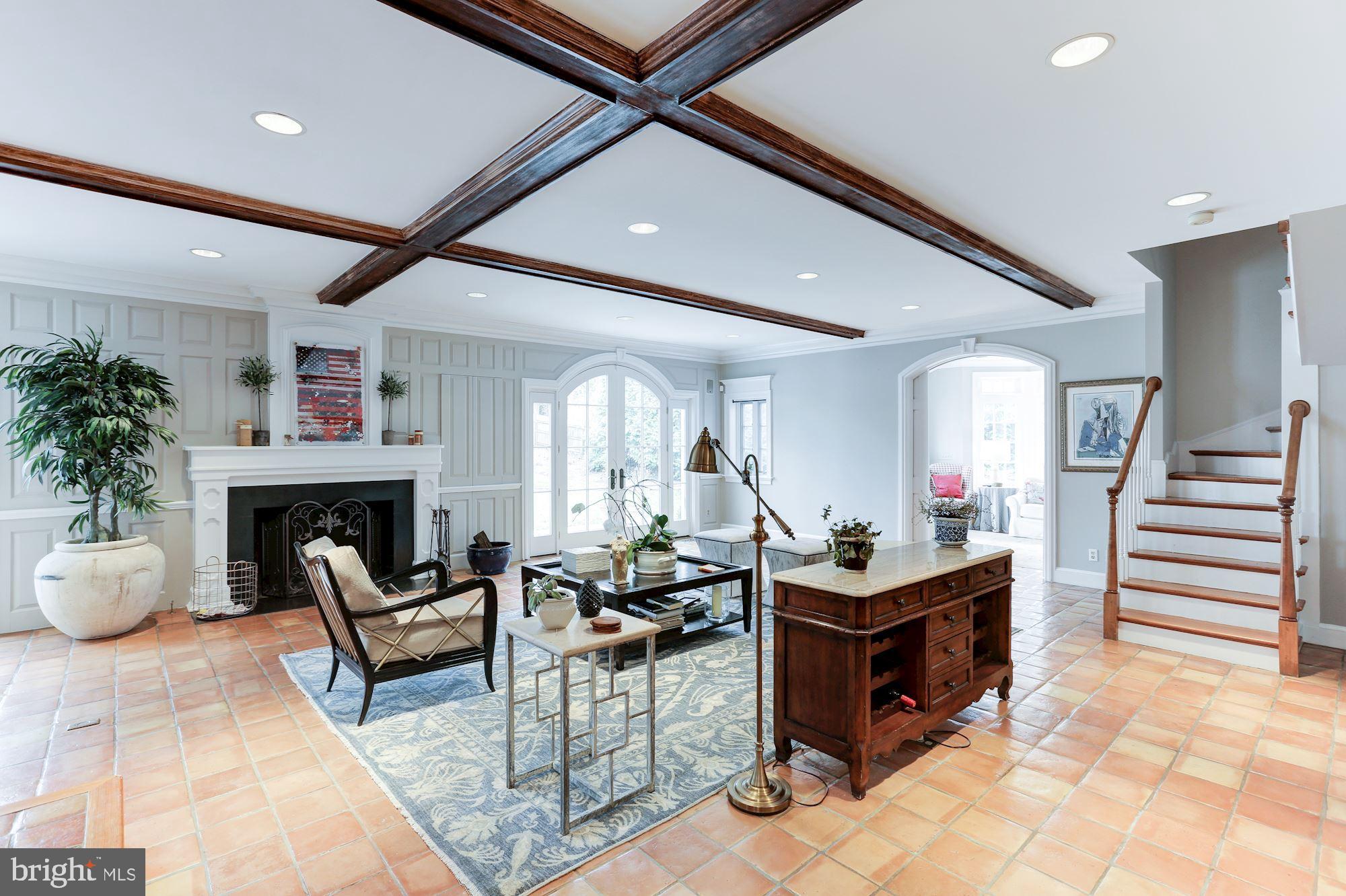 1319 Calder Road McLean, VA 22101 - Photo 17 of 55 a living room with furniture and a fireplace