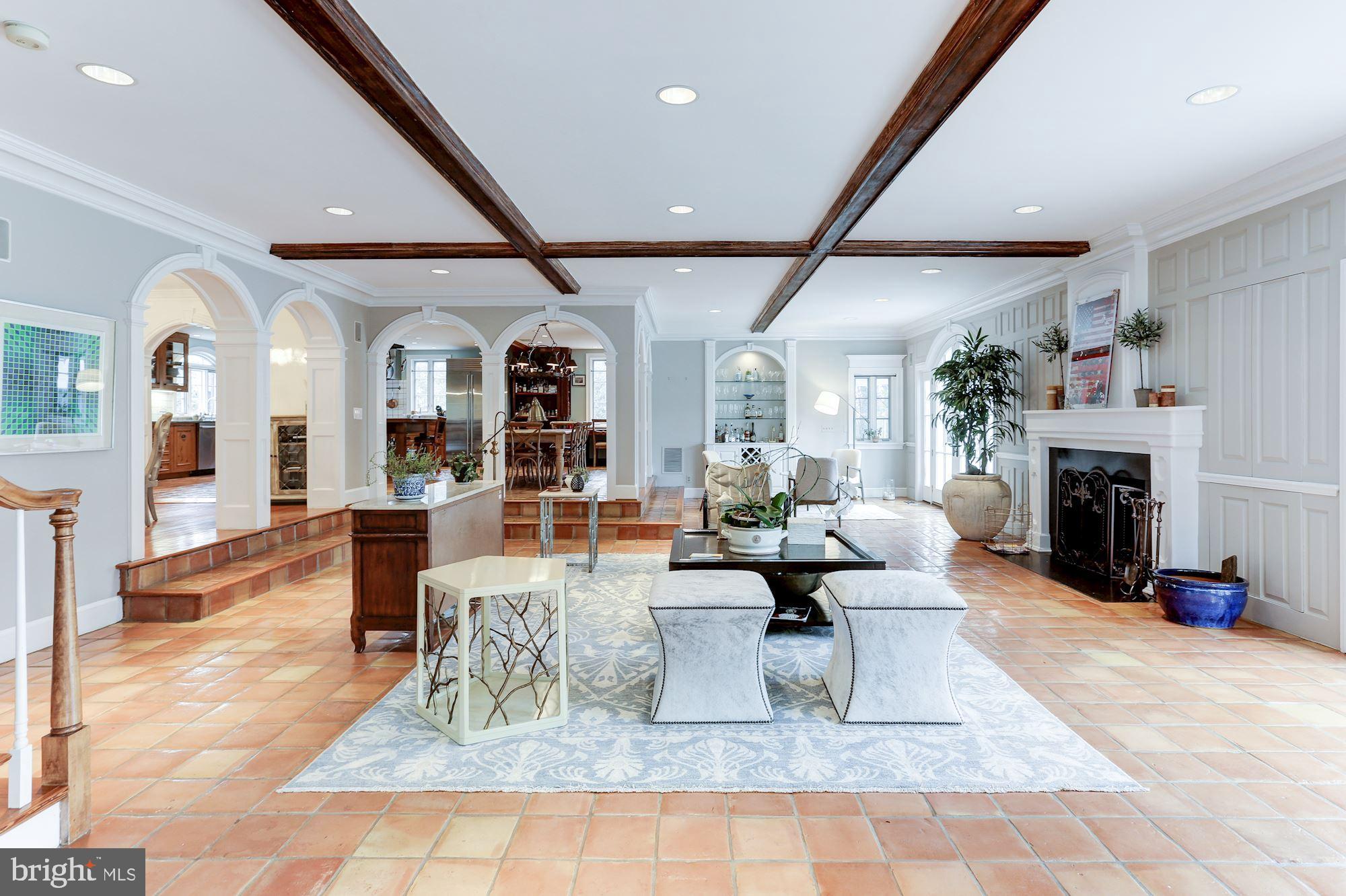 1319 Calder Road McLean, VA 22101 - Photo 18 of 55 a living room with furniture large window and a fireplace