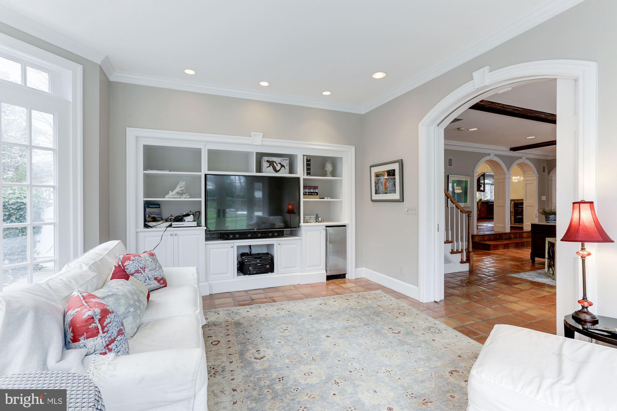 1319 Calder Road McLean, VA 22101 - Photo 22 of 55 a living room with furniture and a flat screen tv