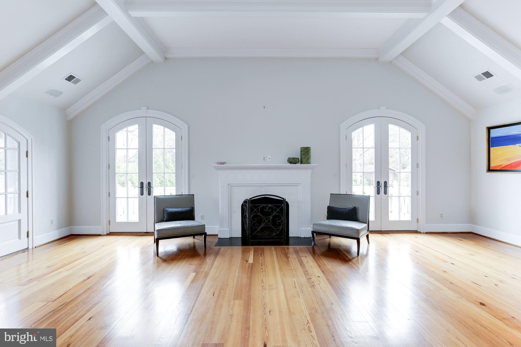 1319 Calder Road McLean, VA 22101 - Photo 28 of 55 a living room with furniture and a fireplace
