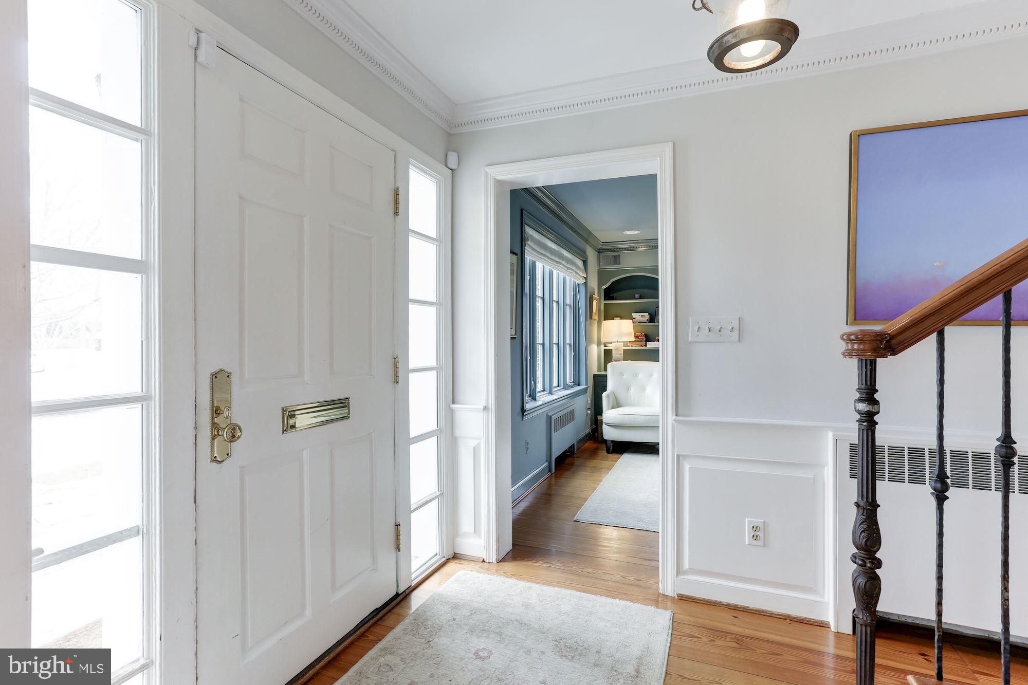 1319 Calder Road McLean, VA 22101 - Photo 4 of 55 a view of a hallway with wooden floor and staircase