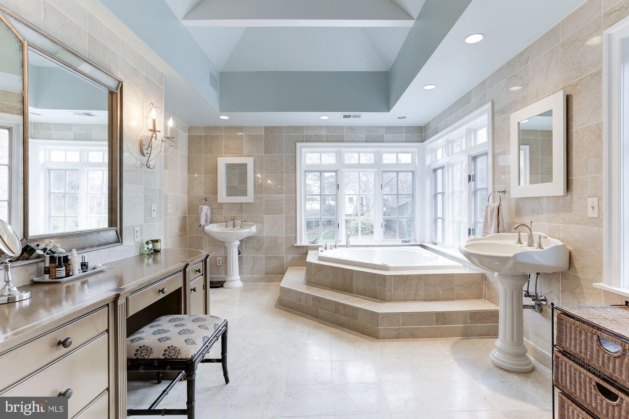 1319 Calder Road McLean, VA 22101 - Photo 31 of 55 a spacious bedroom with a bed and a large window