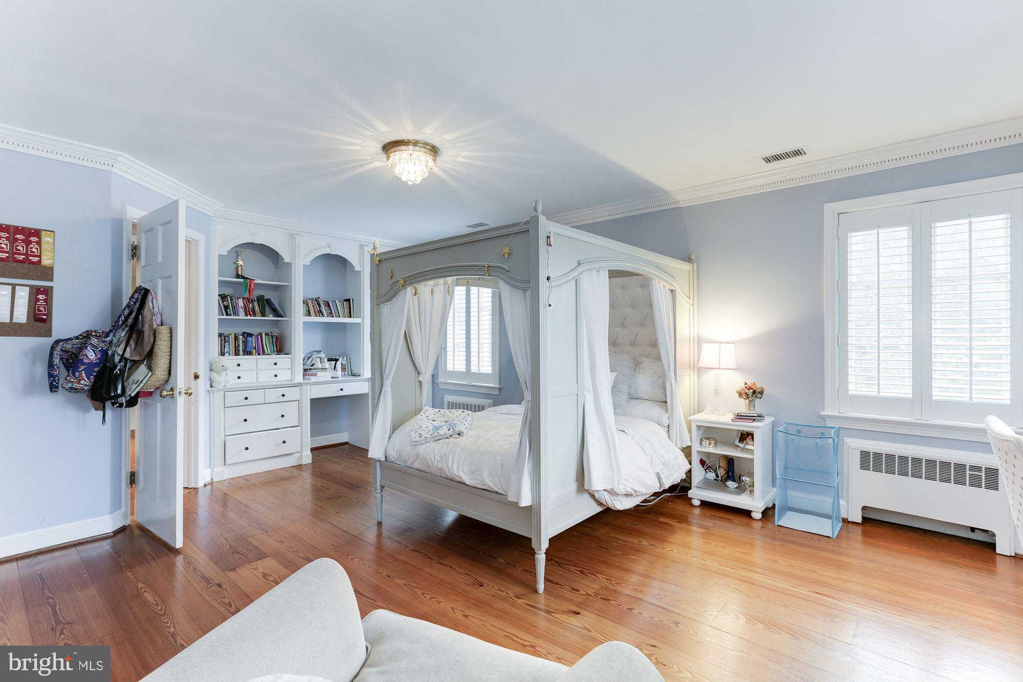 1319 Calder Road McLean, VA 22101 - Photo 32 of 55 a living room with furniture and a wooden floor