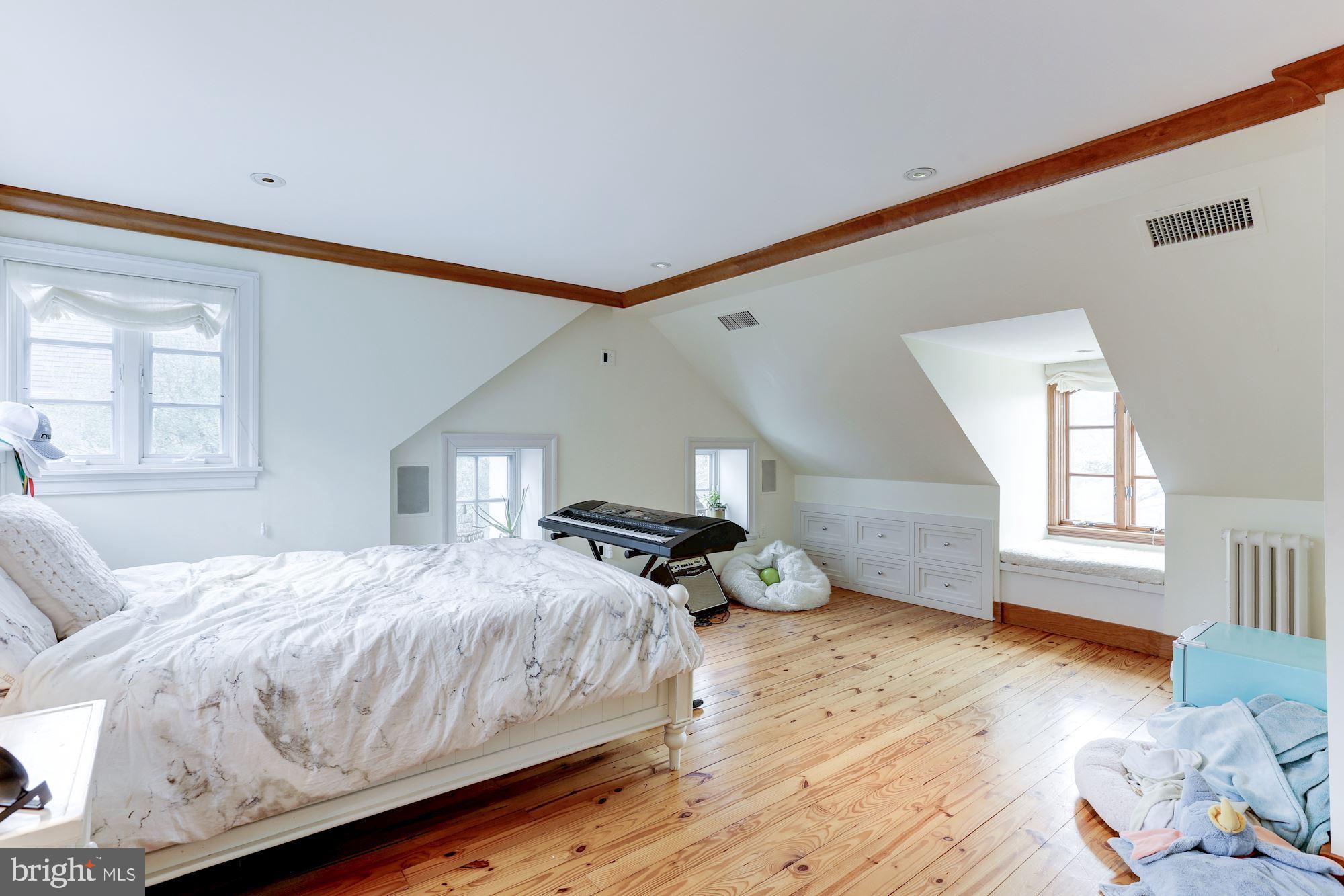 1319 Calder Road McLean, VA 22101 - Photo 37 of 55 a bedroom with a bed and wooden floor