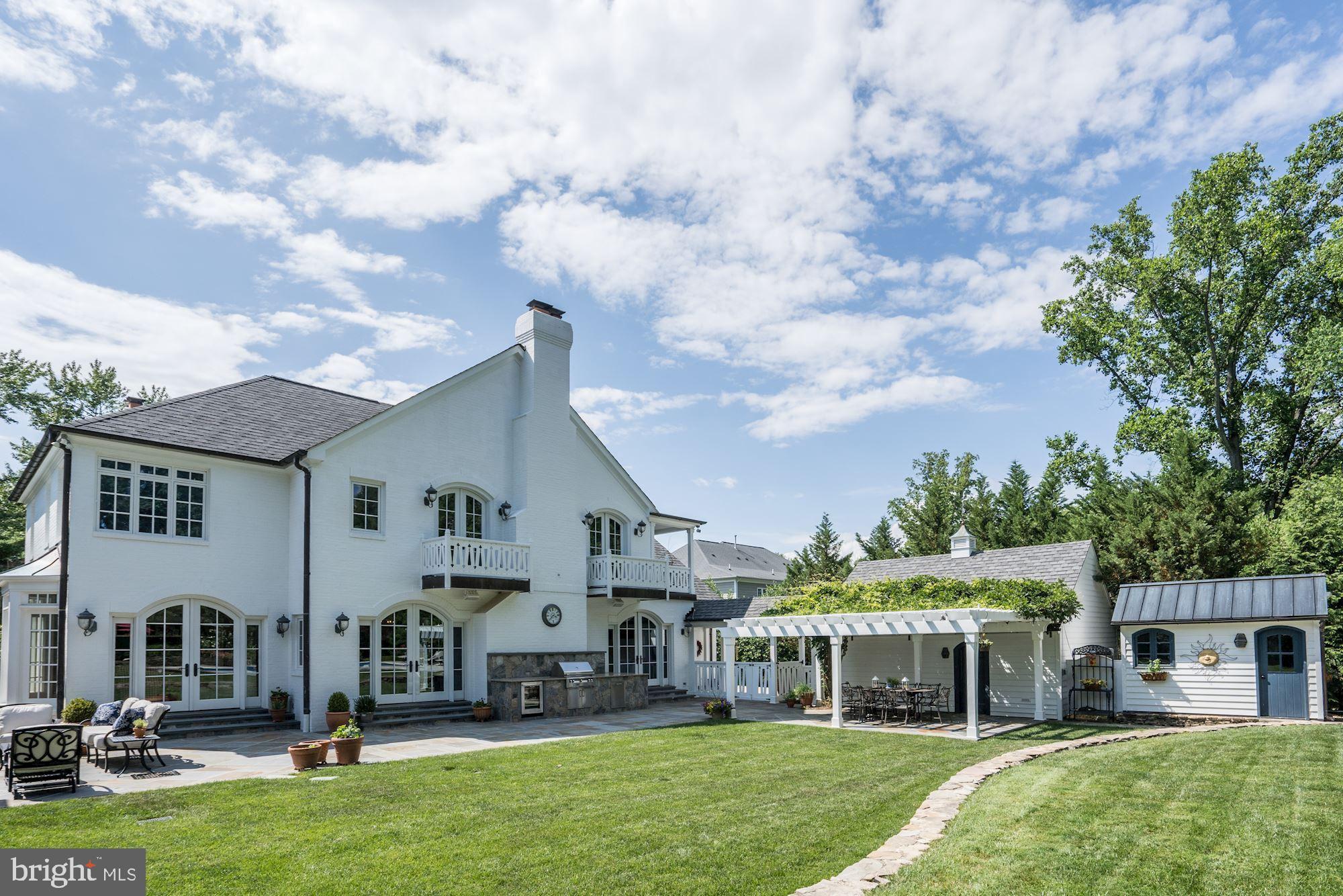 1319 Calder Road McLean, VA 22101 - Photo 43 of 55 front view of a house with a yard
