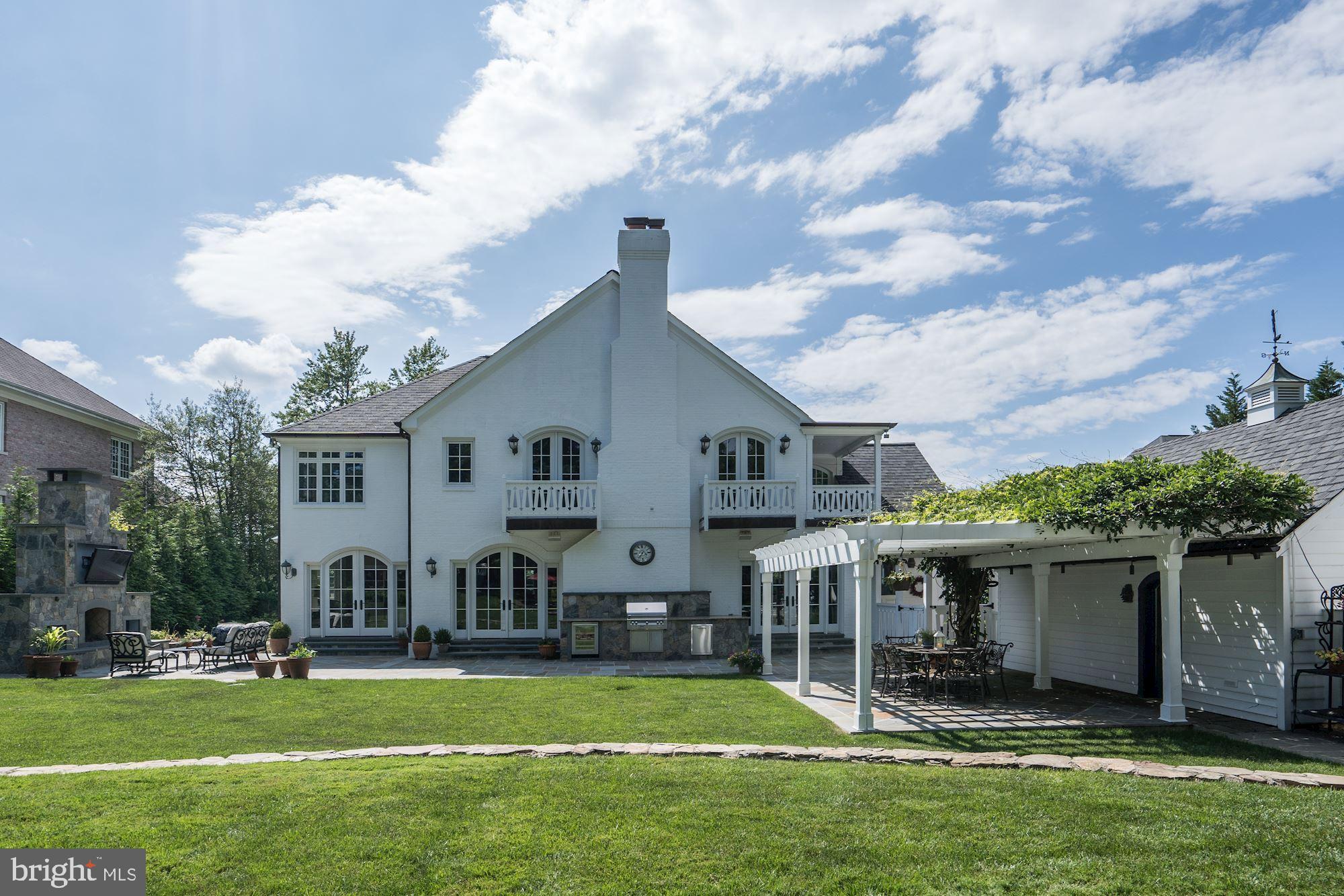 1319 Calder Road McLean, VA 22101 - Photo 44 of 55 a view of a house with a big yard and large tree