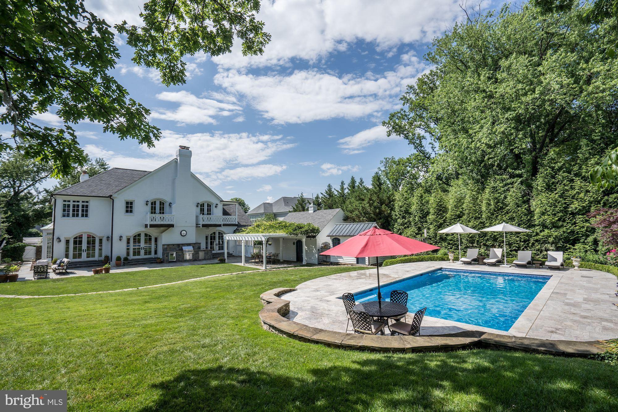 1319 Calder Road McLean, VA 22101 - Photo 52 of 55 a swimming pool with outdoor seating and yard