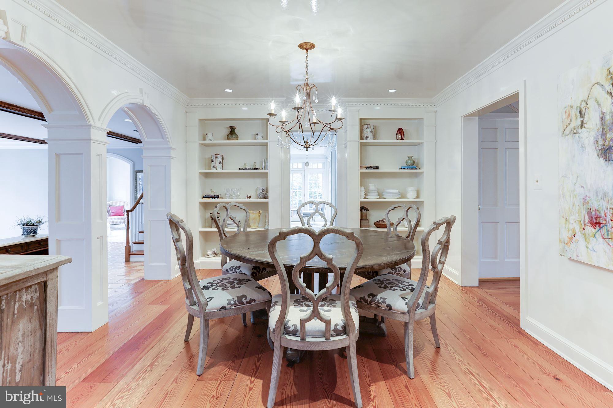 1319 Calder Road McLean, VA 22101 - Photo 8 of 55 a view of a dining room with furniture window and wooden floor