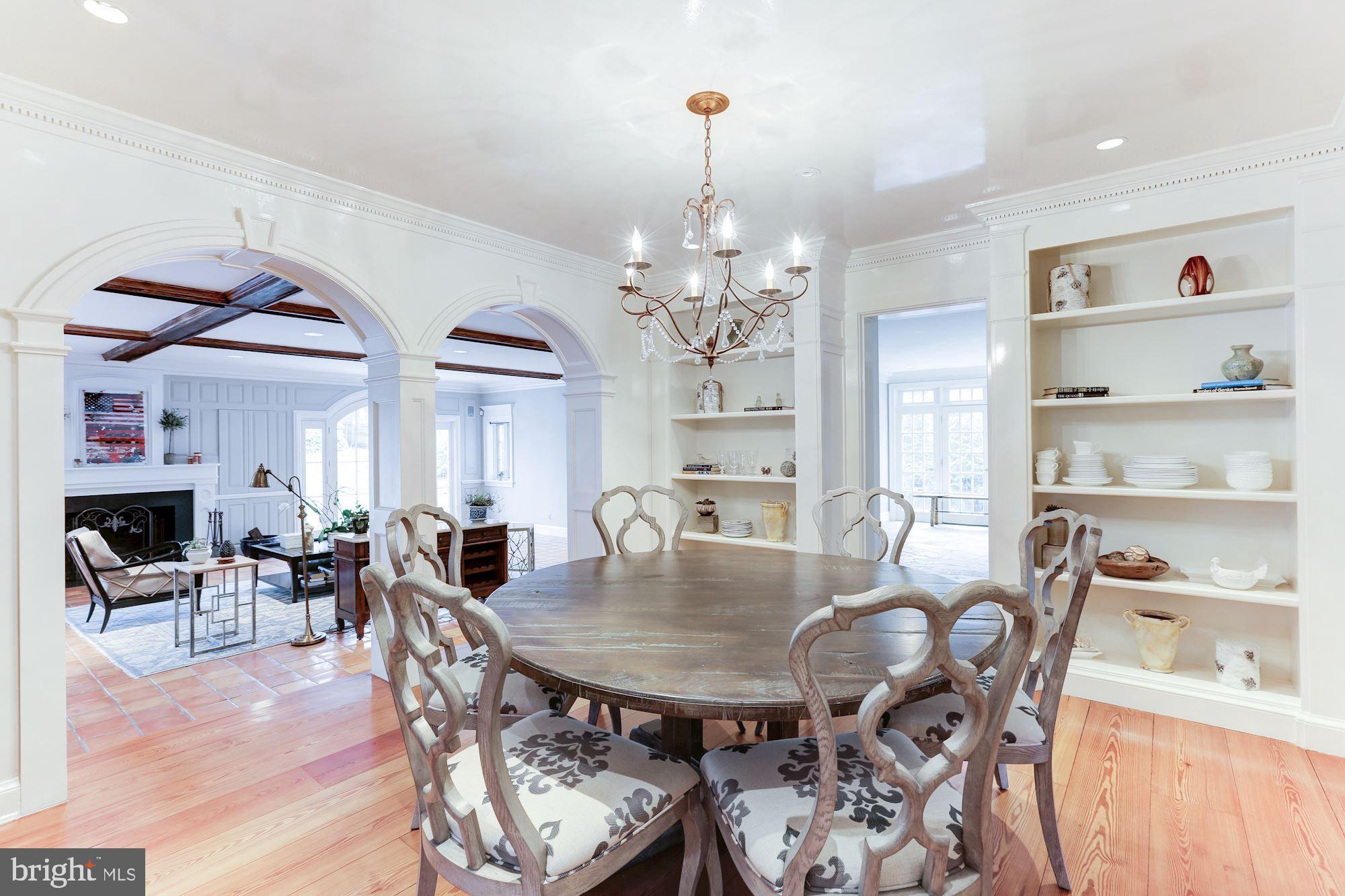 1319 Calder Road McLean, VA 22101 - Photo 9 of 55 a view of a dining room with furniture window and wooden floor