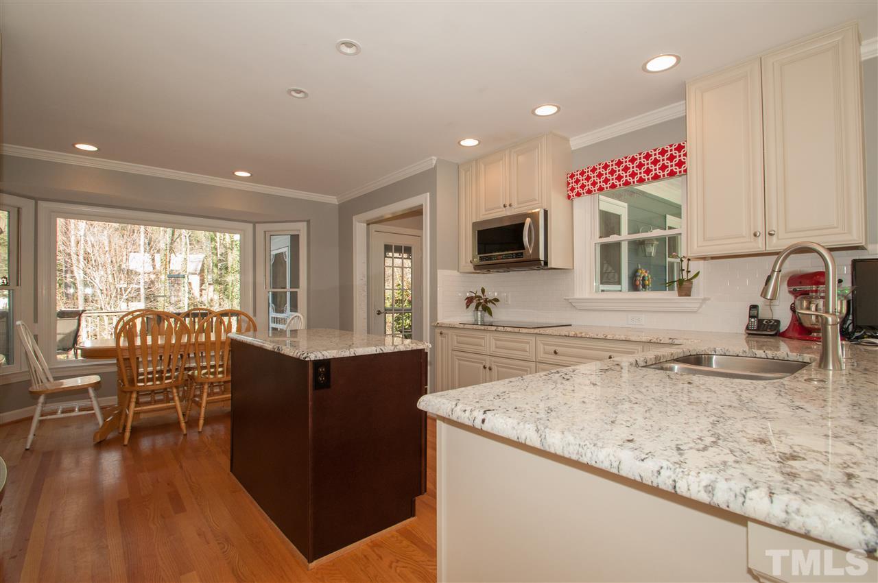 2012 Corberrie Lane Raleigh, NC 27613 - Photo 8 of 25 a kitchen with granite countertop lots of counter top space