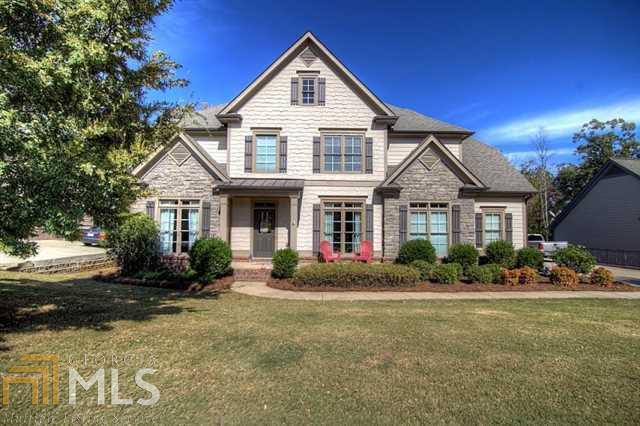 STUNNING 5 BEDROOM, 3 1/2 BATH HOME SITUATED NICELY ON A LEVEL LOT SURROUNDED BY METICULOUS LANDSCAPING!