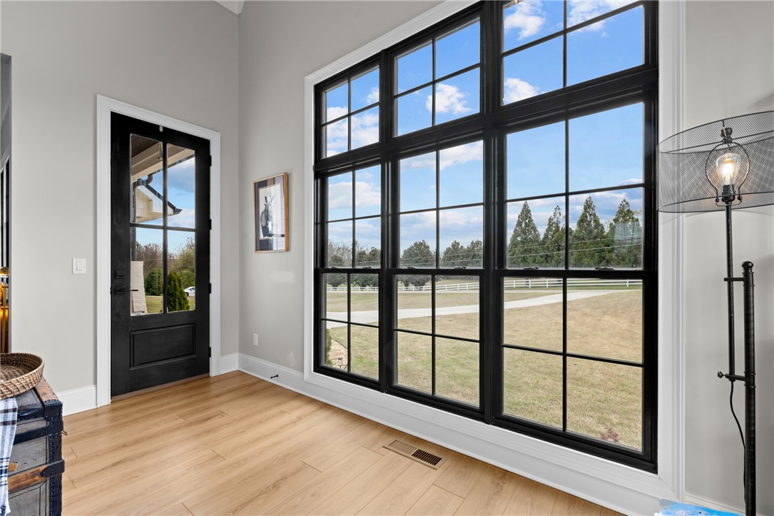 677 Lightwood Road Hartwell, GA 30643 - Photo 5 of 42 This airy space showcases an impressive window, framing picturesque outdoor scenery.