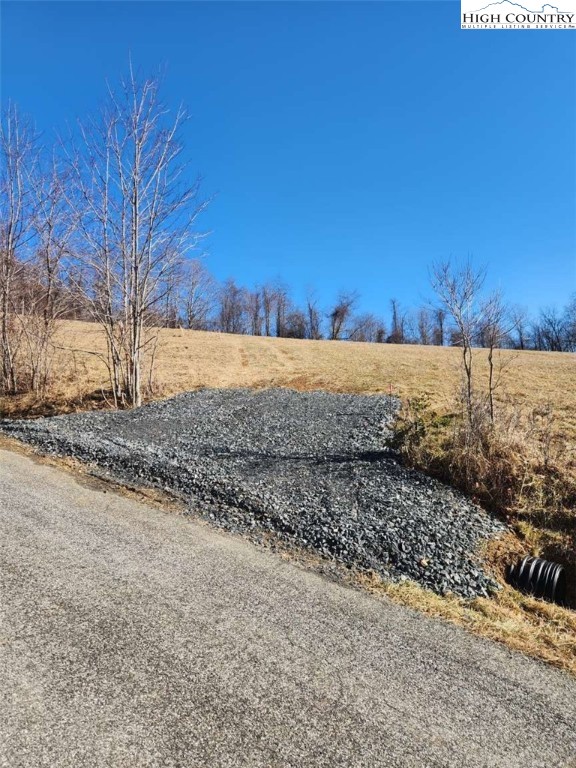 264 Holman Road Todd, NC 28684 - Photo 5 of 6 a view of a yard with a house