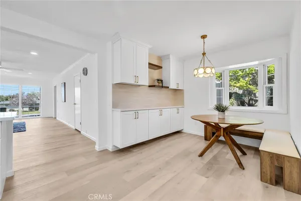 a view of a kitchen and workspace