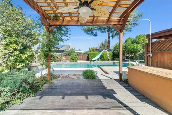 a view of a house with a swimming pool