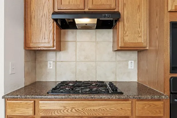 a table with a stove top oven
